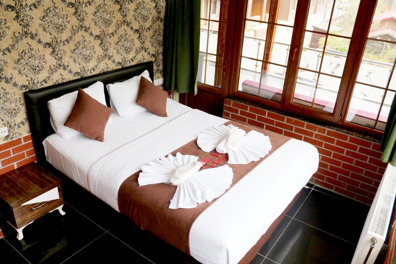 Ayguen Suites Hotel&Bungalow Uzungoel Bagian luar foto